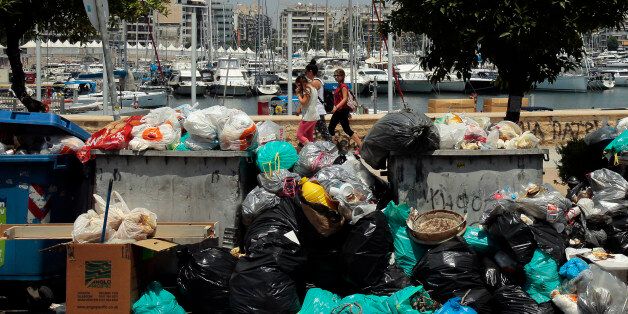 ATHENS, GREECE - JUNE 27: Mounds of rubbish fester in soaring temperatures because of municipal workers' strike on June 27, 2017 in Athens, Greece. With rubbish piling up in parts of the city, Athens municipality urged residents not to take out their waste as temperatures topped 36 Celsius. (Photo by Milos Bicanski/Getty Images)