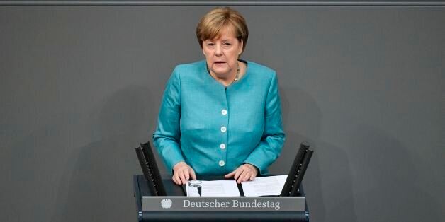 German Chancellor Angela Merkel delivers a speech at the Bundestag, lower house of Parliament, on June 29, 2017 in Berlin, ahead of the July 7-8 G20 summit.Merkel warned against protectionism and isolationism at a time when the world faces global problems including climate change and the threat of terrorism. / AFP PHOTO / John MACDOUGALL (Photo credit should read JOHN MACDOUGALL/AFP/Getty Images)