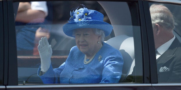 Britain's Queen Elizabeth and Prince Charles are driven to the Palace of Westminster for the State Opening of Parliament in central London, Britain June 21, 2017. REUTERS/Hannah McKay