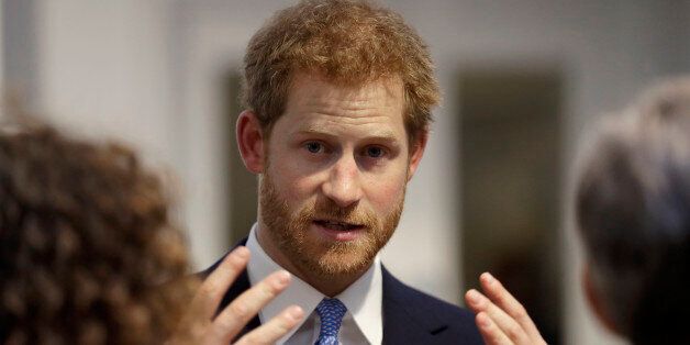 LONDON, UNITED KINGDOM - JUNE 15: Britain's Prince Harry speaks to people during his visit to Chatham House, the Royal Institute of International Affairs on June 15, 2017 in London, England.. Prince Harry visited Thursday to open their new extension, The Stavros Niarchos Foundation Floor, which will provide a permanent home for the Queen Elizabeth II Academy for Leadership in International Affairs, along with new meeting and work spaces. (Photo by Matt Dunham - WPA Pool/Getty Images)