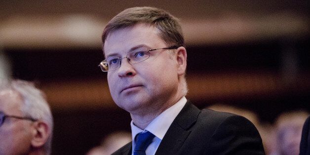 Valdis Dombrovskis, vice president of the European Commission, looks on during the Brussels Economic Forum in Brussels, Belgium, on Thursday, June 1, 2017. It may take the U.K. as long as five years to leave the European Union, with the process set to do major harm to both parties, billionaire investor George Soros said, urging the worlds biggest trading bloc to avoid penalizing Britain and instead focus on reforming itself. Photographer: Marlene Awaad/Bloomberg via Getty Images