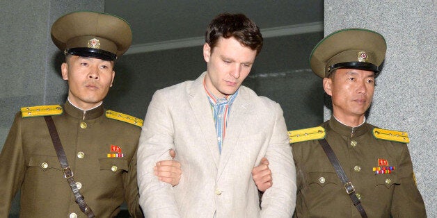 FILE PHOTO - Otto Frederick Warmbier (C), a University of Virginia student who was detained in North Korea since early January, is taken to North Korea's top court in Pyongyang, North Korea, in this photo released by Kyodo March 16, 2016. Mandatory credit REUTERS/Kyodo ATTENTION EDITORS - THIS IMAGE HAS BEEN SUPPLIED BY A THIRD PARTY. FOR EDITORIAL USE ONLY. NOT FOR SALE FOR MARKETING OR ADVERTISING CAMPAIGNS. MANDATORY CREDIT. JAPAN OUT. NO COMMERCIAL OR EDITORIAL SALES IN JAPAN