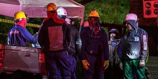 A miners gestures during search operations outside of 'La Guasca' mine in a rural area of Cucunuba, Cundinamarca department on June 24, 2017.An explosion at a central Colombian coal mine killed at least two people, as rescuers scrambled to find another 11 who are still missing, authorities said, updating earlier figures. / AFP PHOTO / Luis Acosta (Photo credit should read LUIS ACOSTA/AFP/Getty Images)