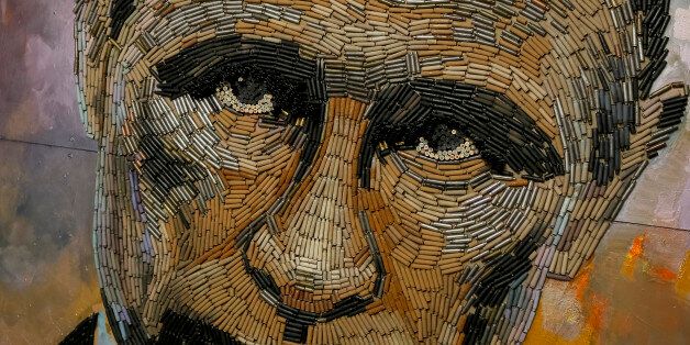THIS IMAGE IS BINNEDA portrait of Russian President Vladimir Putin, made out of 5,000 cartridges brought from the frontline in eastern Ukraine, named