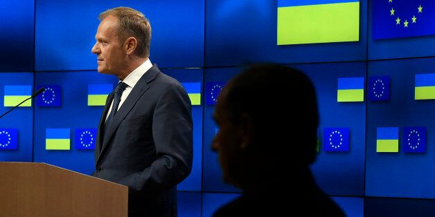 President of the European Union Council Donald Tusk (R) delivers a speech during a joint press conference with Ukrainian President as part of the EU leaders summit at the European Council, in Brussels, on June 22, 2017. / AFP PHOTO / JOHN THYS (Photo credit should read JOHN THYS/AFP/Getty Images)