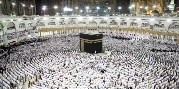 Muslim worshippers pray at the Kaaba, Islam's holiest shrine, at the Grand Mosque in Saudi Arabia's holy city of Mecca on June 23, 2017, during the last Friday of the holy month of Ramadan. / AFP PHOTO / BANDAR ALDANDANI (Photo credit should read BANDAR ALDANDANI/AFP/Getty Images)