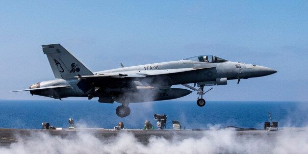 MEDITERRANEAN SEA - JUNE 6: In this handout provided by the U.S. Navy, an F/A-18E Super Hornet attached to the 'Tomcatters' of Strike Fighter Squadron (VFA) 31 launches from the flight deck of the Nimitz-class aircraft carrier USS George H.W. Bush (CVN 77) to conduct flight operations in support of Operation Inherent Resolve June 6, 2017 in the Mediterranean Sea. George H.W. Bush is conducting naval operations in the U.S. 6th Fleet area of operations in support of U.S. national security interests. (U.S. Navy photo by Mass Communication Specialist 2nd Class Christopher Gaines/Released)