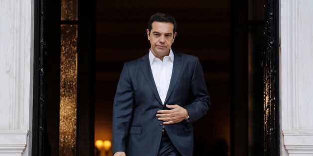 Greek Prime Minister Alexis Tsipras waits to welcome his Turkish counterpart Binali Yildirim at the Maximos Mansion in Athens, Greece June 19, 2017. REUTERS/Costas Baltas