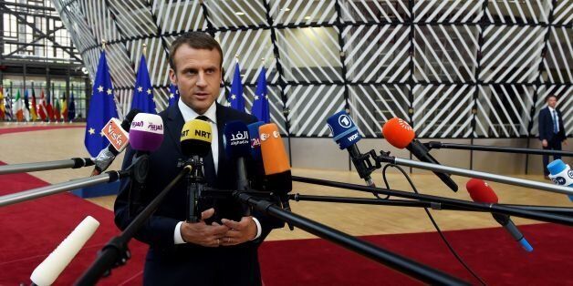 French President Emmanuel Macron speaks to the press as he arrives at the Europa Building, the main headquarters of European Council, in Brussels ahead of the EU leaders summit, in Brussels, on June 22, 2017. / AFP PHOTO / THIERRY CHARLIER (Photo credit should read THIERRY CHARLIER/AFP/Getty Images)
