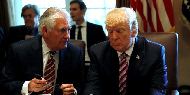 U.S. President Donald Trump talks with Secretary of State Rex Tillerson during a meeting with members of his Cabinet at the White House in Washington, U.S., June 12, 2017. REUTERS/Kevin Lamarque