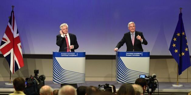 British Secretary of State for Exiting the European Union (Brexit Minister) David Davis (L) and European Commission member in charge of Brexit negotiations with Britain, Michel Barnier address a press conference at the end of the first day of Brexit negotiations at the European Commission in Brussels on June 19, 2017. Britain and the European Union started Brexit negotiations in Brussels on June 19, 2017. / AFP PHOTO / EMMANUEL DUNAND (Photo credit should read EMMANUEL DUNAND/AFP/Getty Images)