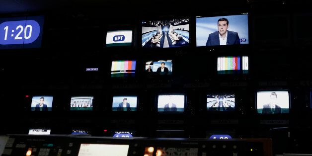 Alexis Tsipras, former Greek prime minister and leader of the Syriza party, appears on a TV monitor during a television debate at the studios of Greek state broadcaster ERT, also known as the Hellenic Broadcasting Organisation, in Athens, Greece, on Thursday, Sept. 10, 2015. An opinion poll over the weekend showed that no party is projected to gain enough votes for an outright parliamentary majority, signaling coalition talks may be needed. Photographer: Kostas Tsironis/Bloomberg via Getty Image
