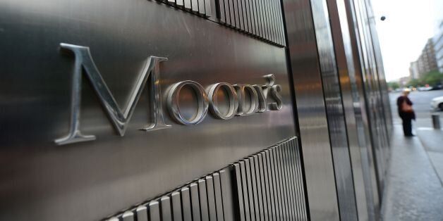 A sign for Moody's rating agency stands in front of the company headquarters in New York, September 18, 2012. AFP PHOTO/Emmanuel Dunand / AFP / EMMANUEL DUNAND (Photo credit should read EMMANUEL DUNAND/AFP/Getty Images)