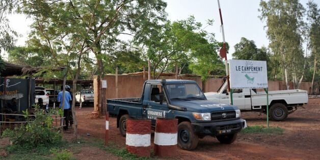 A vehicle of the gendarmarie is parked at the entrance to the Kangaba tourist resort in Bamako on June 19, 2017, a day after suspected jihadists stormed the resort, briefly seizing more than 30 hostages and leaving at least two people dead.The assault on the resort comes after a similar strike less than two years ago on a luxury hotel in Bamako, which lies in the south of the troubled country. Four assailants were killed by security forces, Mali's security minister said late June 18, without specifying if more were on the run. / AFP PHOTO / HABIBOU KOUYATE (Photo credit should read HABIBOU KOUYATE/AFP/Getty Images)