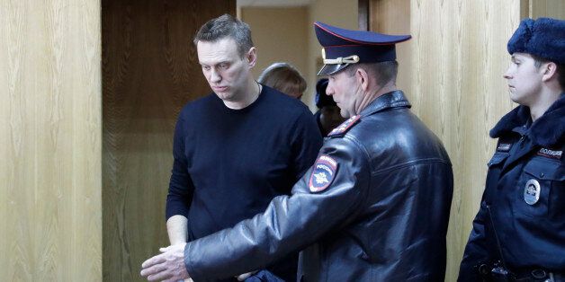 Russian opposition leader Alexei Navalny attends a hearing after being detained at the protest against corruption and demanding the resignation of Prime Minister Dmitry Medvedev, at the Tverskoi court in Moscow, Russia March 27, 2017. REUTERS/Tatyana Makeyeva