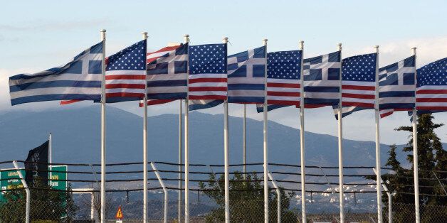 AIRPORT EL VENIZELOS, ATHENS, ATTIKI, GREECE - 2016/11/16: Greek and USA flags in the airport of Athens, EL. Venizelos. (Photo by Dimitrios Karvountzis/Pacific Press/LightRocket via Getty Images)