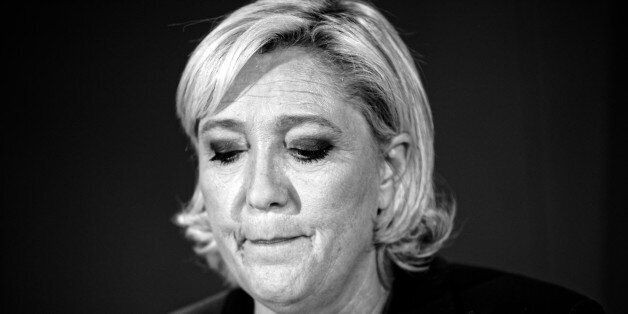HENIN-BEAUMONT, FRANCE - JUNE 11: (EDITORS NOTE: Image has been converted to black and white.) French National Front (FN) political party leader and candidate for French legislative elections, Marine Le Pen makes a statement after the results of the first round on June 11, 2017 in Henin-Beaumont, France. Marine Le Pen won more than 45% of votes in the first round of the legislative elections, a higher score obtained in the first round of the presidential election (Photo by Sylvain Lefevre/Getty Images)