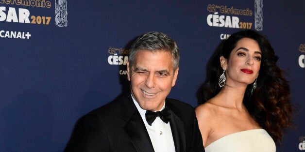 PARIS, FRANCE - FEBRUARY 24: George Clooney and Amal Clooney arrive at the Cesar Film Awards 2017 at Salle Pleyel on February 24, 2017 in Paris, France. (Photo by François Pauletto/Corbis via Getty Images)
