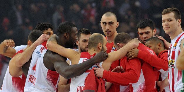 ATHENS, GREECE - JANUARY 06: Players of Olympaicos react after winning the match during the 2016/2017 Turkish Airlines EuroLeague Regular Season Round 16 game between Olympiacos Piraeus v Panathinaikos Superfoods Athens at Peace and Friendship Stadium on January 6, 2017 in Athens, Greece. (Photo by Panagiotis Moschandreou/EB via Getty Images)