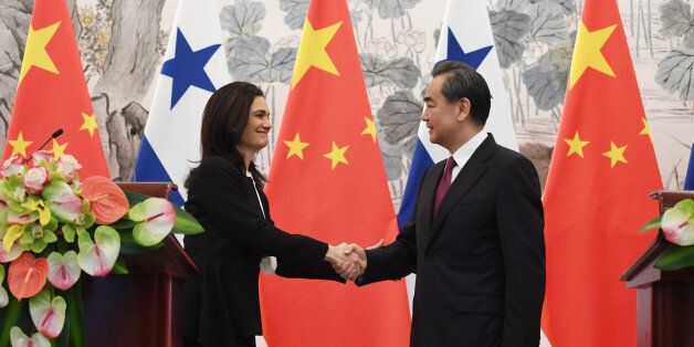 BEIJING, CHINA - JUNE 13: Panama's Foreign Minister Isabel de Saint Malo (L) shakes hands with Chinese Foreign Minister Wang Yi during a joint press briefing on June 13, 2017 in Beijing, China (Photo by Greg Baker - Pool/Getty Images)