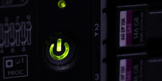 A green light signals the power switch on a computer server unit inside a communications room at an office in London, U.K., on Monday, May 15, 2017. Governments and companies around the world began to gain the upper hand against the first wave of an unrivaled globalÂ cyberattack, even as the assault was poised to continue claiming victims this week.Â Photographer: Chris Ratcliffe/Bloomberg via Getty Images