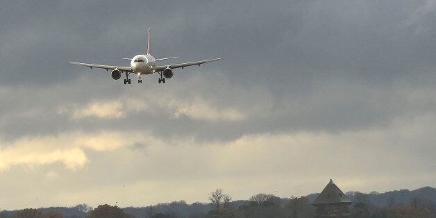 LUTON, UNITED KINGDOM - NOVEMBER 21: An EasyJet approaches the runway sideways and on touchdown immediately powers up and takes off again, on November 21, 2016 in Luton, England. The nose wheel never touched down and the plane only had its main wheels on the runway for a second or two. The aircraft is seen in the final pictures, through a fence as it passed by.PHOTOGRAPH BY Tony Margiocchi / Barcroft ImagesLondon-T:+44 207 033 1031 E:hello@barcroftmedia.com -New York-T:+1 212 796 2458 E:hello@barcroftusa.com -New Delhi-T:+91 11 4053 2429 E:hello@barcroftindia.com www.barcroftimages.com (Photo credit should read Tony Margiocchi/Barcroft Images / Barcroft Media via Getty Images)