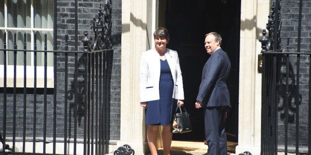 DUP leader Arlene Foster (L) and MP Nigel Dodds arrive at 10 Downing Street on June 13, 2017 in London, England. Discussions between the DUP and the Conservative party are continuing in the wake of the UK general election as Prime Minister Theresa May looks to form a government with the help of the Democratic Unionist party's ten Westminster seats. (Photo by Alberto Pezzali/NurPhoto via Getty Images)