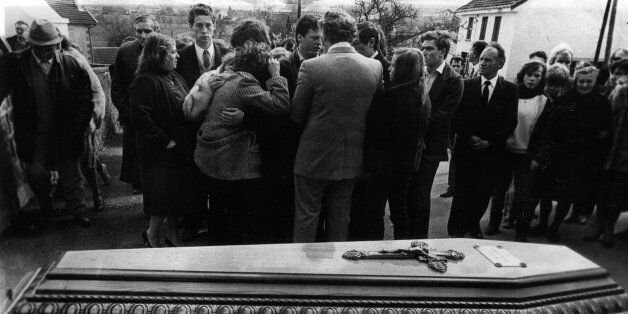The family of Bernard Laroche cries close to his coffin during the funeral ceremony in Jussarupt village, eastern France, April 2, 1985. Laroche has been shot to death by his cousin Jean-Marie Villemin, the father of murdered 4-year-old Gregory. REUTERS/Stringer (FRANCE)