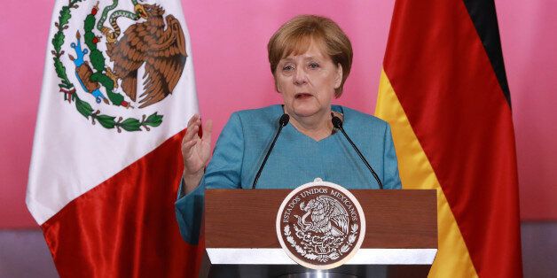 Angela Merkel, Germany's chancellor, speaks during a joint press conference with Enrique Pena Nieto, Mexico's president, not pictured, at the National Palace in Mexico City, Mexico, on Friday, June 10, 2017. Merkel said Group of 20 leaders wont get everything we wished for at a summit next month after U.S. President Donald Trumps decision to exit the Paris climate accord. Photographer: Susana Gonzalez/Bloomberg via Getty Images