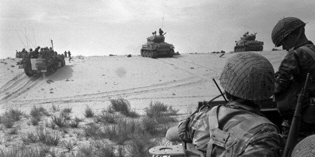 Israeli tanks manoeuvre on the outskirts of Rafah, in the southern Gaza Strip, during the Middle East War June 5, 1967, in this handout picture released by the Israeli Government Press Office (GPO) on June 3, 2007. Tuesday marks forty years since Israel swept to victory in six days in a war with Egypt, Syria and Jordan, capturing the Sinai peninsula, the Golan Heights, the Gaza Strip and the West Bank, including Arab East Jerusalem. BLACK AND WHITE ONLY REUTERS/Micha Han/GPO/Handout ISRAEL OUT. EDITORIAL USE ONLY. NOT FOR SALE FOR MARKETING OR ADVERTISING CAMPAIGNS.