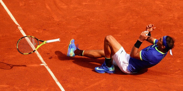 PARIS, FRANCE - JUNE 11: Rafael Nadal of Spain celebrates victory following the mens singles final against Stan Wawrinka of Switzerland on day fifteen of the 2017 French Open at Roland Garros on June 11, 2017 in Paris, France. (Photo by Clive Brunskill/Getty Images)