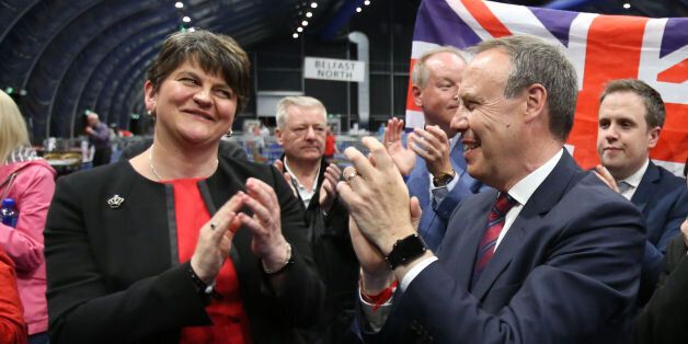 DUP leader Arlene Foster and deputy leader Nigel Dodds cheer as Emma Little Pengelly is elected to the South Belfast constituency at the Titanic exhibition centre in Belfast where counting is taking place in the 2017 General Election.