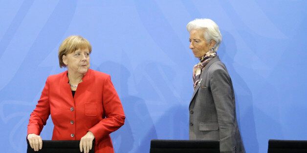 Christine Lagarde, Managing Director of the International Monetary Fund (IMF) and German Chancellor Angela Merkel arrive for a news conference following a meeting of the heads of international economy and finance organizations at the Chancellery in Berlin, Germany, April 5, 2016. REUTERS/Hannibal Hanschke