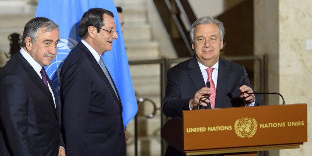 United Nations Secretary General Antonio Guterres arrives with Greek Cypriot President Nicos Anastasiades and Turkish Cypriot leader Mustafa Akinci, for a news conference after the Conference on Cyprus Peace Talks, at the European headquarters of the United Nations in Geneva, Switzerland, January 12, 2017. REUTERS/Martial Trezzini/Pool