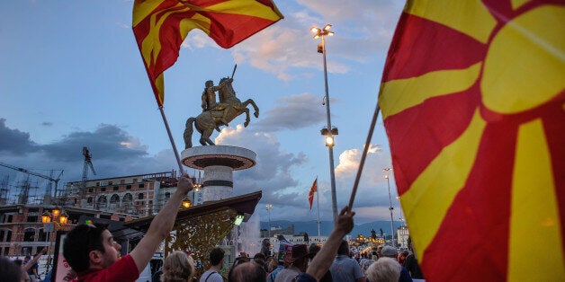 Macedonia(FYROM), Skopje, 02.06.2016 - Colorful RevolutionMacedonias Colorful Revolution has caused daily protests in the City Center of Macedonias Capital Skopje. The People protest the corrupt Government of prime minister Nikola Gruevski (VRMO), by defacing the symbols and monuments of his reign with color bombs, spray paint and paint rollers, even make shift catapults have been used.People march onto the Macedonia Square with the Statue of Alexander the Great of Makedonia carrying flags and banners (Photo by Maximilian von Lachner/NurPhoto via Getty Images)