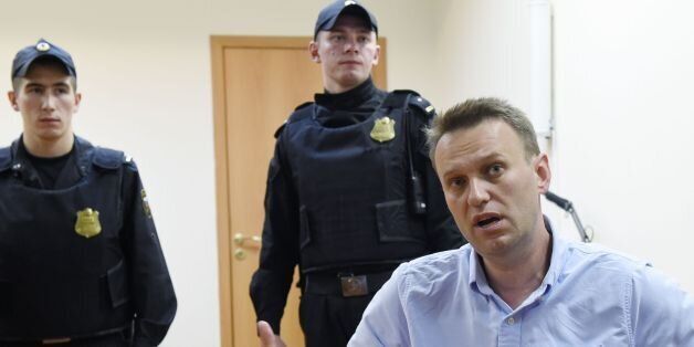 Russian opposition leader Alexei Navalny speaks after a hearing in a court in Moscow, late on June 12, 2017. Navalny was sentenced to 30 days in prison for calling unauthorized demonstrations held throughout Russia. / AFP PHOTO / VASILY MAXIMOV (Photo credit should read VASILY MAXIMOV/AFP/Getty Images)