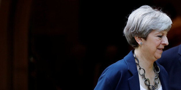 Britain's Prime Minister Theresa May leaves after a church service in Sonning, Britain June 11, 2017. REUTERS/Stefan Wermuth