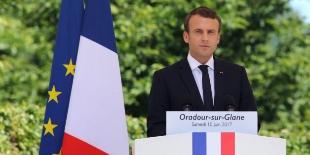 French President Emmanuel Macron (C) delivers a speech during a commemoration ceremony marking the 73rd anniversary of the World War II massacre in Oradour-sur-Glane, Haute-Vienne, France, on June 10, 2017.On June 10, 1944, SS troops massacred 642 inhabitants of the village of Oradour-sur-Glane. / AFP PHOTO / PASCAL LACHENAUD (Photo credit should read PASCAL LACHENAUD/AFP/Getty Images)