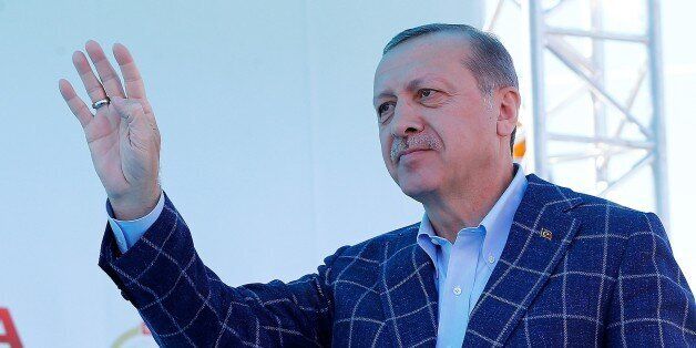 ANTALYA, TURKEY - MARCH 25 : Turkish President Recep Tayyip Erdogan greets the crowd during a mass opening ceremony at Kepez Arena in Antalya, Turkey on March 25, 2017. (Photo by Mehmet Ali Ozcan/Anadolu Agency/Getty Images)