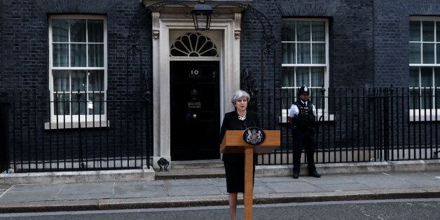 Theresa May, U.K. prime minister, delivers a statement outside number 10 Downing Street following the terror attack in London, U.K., on Sunday, June 4, 2017.Â A van swerved into Saturday-night crowds on London Bridge, before three men got out and went on a stabbing rampage through nearby bars.Â Photographer: Chris Ratcliffe/Bloomberg via Getty Images