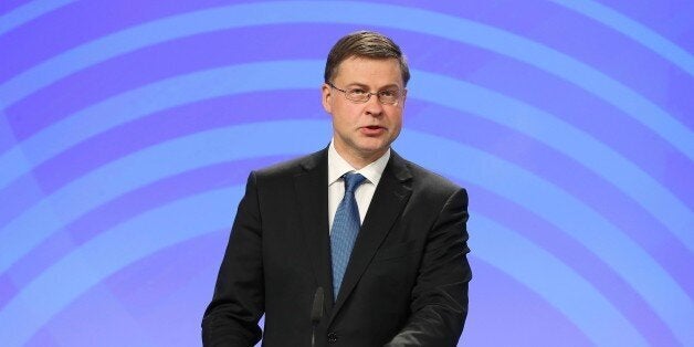 BRUSSELS, BELGIUM - MAY 22: Vice-President of the European Commission, Valdis Dombrovskis speaks during a joint press conference with Marianne Thyssen (not seen), Member of the European Commission in charge of Employment, Social Affairs, Skills and Labour Mobility, an Pierre Moscovici (not seen), Member of the European Commission in charge of Economic and Financial Affairs, Taxation and Customs, in Brussels, Belgium on May 22, 2017. (Photo by Dursun Aydemir/Anadolu Agency/Getty Images)