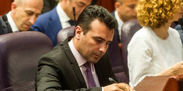 The new Prime-minister of Macedonia, Zoran Zaev, signs an oath in the Macedonian Parliament building in Skopje on May 31, 2017. / AFP PHOTO / Robert ATANASOVSKI (Photo credit should read ROBERT ATANASOVSKI/AFP/Getty Images)