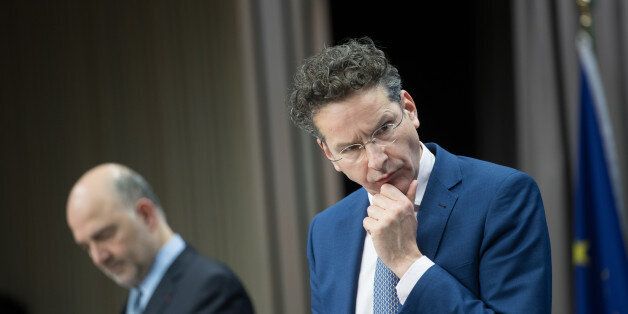 Jeroen Dijsselbloem, Dutch finance minister and head of the group of euro-area finance ministers, listens during a news conference following a Eurogroup meeting of finance ministers in Brussels, Belgium, on Monday, March 20, 2017. Wolfgang Schaeuble, Germany's finance minister, said to reporters ahead of the meeting of euro-area finance ministers We'll get a report on Greece, but the mission isn't completed. Photographer: Jasper Juinen/Bloomberg via Getty Images