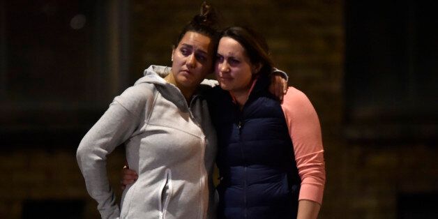 Women embrace after an incident near London Bridge in London, Britain June 4, 2017 REUTERS/Hannah Mckay