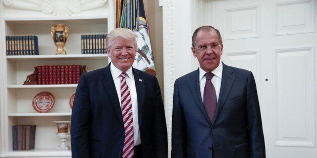 WASHINGTON, USA - MAY 10: US President Donald Trump (R) and Russia's Foreign Minister Sergei Lavrov (L) pose for a photo as they meet at the Oval Office of White House in Washington, D.C., United States on May 10, 2017. (Photo by Russia Foreign Minister Press Ofice /Anadolu Agency/Getty Images)