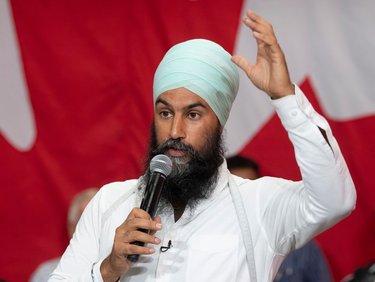 NDP Leader Jagmeet Singh responds to questions from the media after a town hall in Toronto on Sept. 18, 2019.