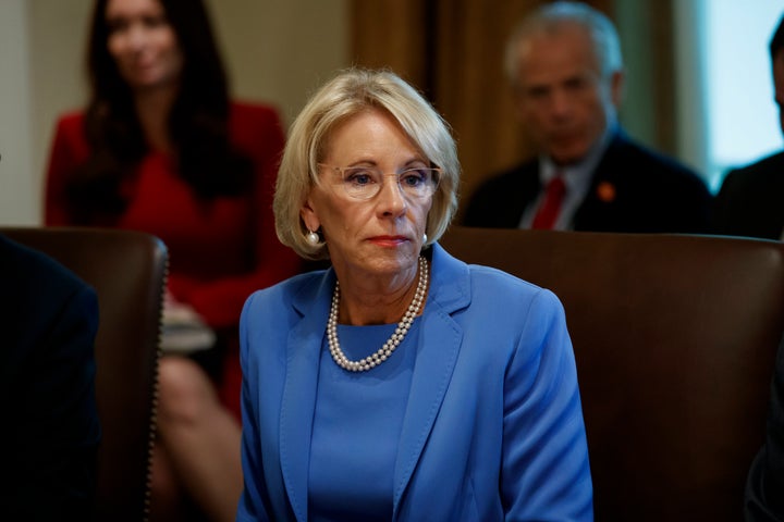 Education Secretary Betsy DeVos listens during a Cabinet meeting in the Cabinet Room of the White House in Washington.