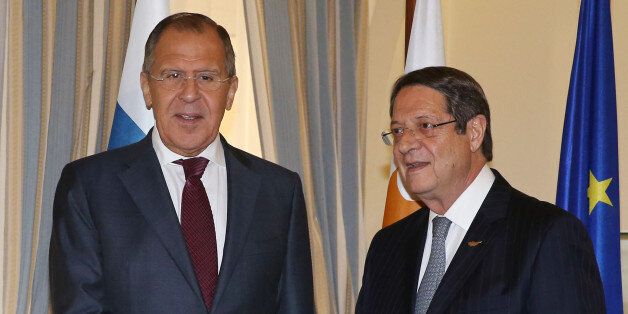 Cypriot President Nicos Anastasiades (R) meets with Russian Foreign Minister Sergei Lavrov at the presidential palace in the capital Nicosia on May 19, 2017, on the sidelines of the Council of Europe meeting. / AFP PHOTO / POOL / Katia CHRISTODOULOU (Photo credit should read KATIA CHRISTODOULOU/AFP/Getty Images)