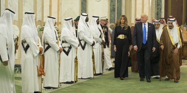 RIYADH, SAUDI ARABIA - MAY 20: (----EDITORIAL USE ONLY MANDATORY CREDIT - 'BANDAR ALGALOUD / SAUDI ROYAL COUNCIL / HANDOUT' - NO MARKETING NO ADVERTISING CAMPAIGNS - DISTRIBUTED AS A SERVICE TO CLIENTS----) Saudi Arabia's King Salman bin Abdulaziz Al Saud (R) welcomes U.S. President Donald Trump (right 2) and his wife Melania Trump (right 3) prior to their meeting at Al-Yamamah Palace in Riyadh, Saudi Arabia on May 20, 2017. (Photo by Bandar Algaloud / Saudi Royal Council / Handout/Anadolu Agency/Getty Images)
