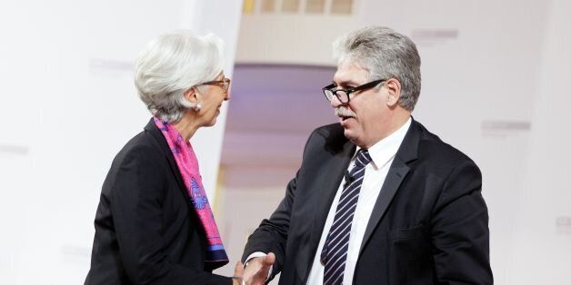 IMF chief Christine Lagarde (L) and Austrian Finance Minister Hans Joerg Schelling (R) shake hands during the event 'Finance in a Dialogue - Challenges in Europe' at the Hofburg Palace in Vienna, Austria, on June 17, 2016.The event is dedicated, among others, to the potential consequences of a British exit from the EU. / AFP / APA / GEORG HOCHMUTH / Austria OUT (Photo credit should read GEORG HOCHMUTH/AFP/Getty Images)